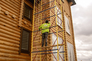 Фото 18. Работы по шлифовке и покраске деревянного дома