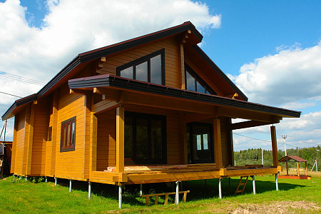 Полутораэтажный дом шале из бруса 11х12 с террасой Собина