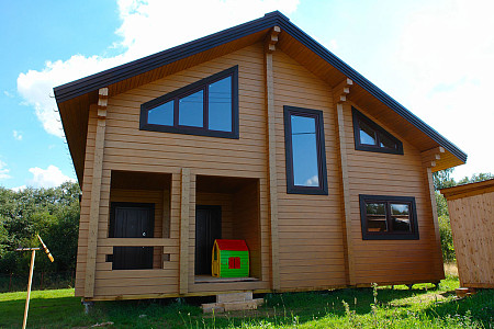 Дом шале из бруса с сауной полутораэтажный 10х11 Мира